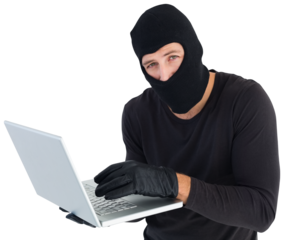 Burglar standing holding laptop while looking at camera