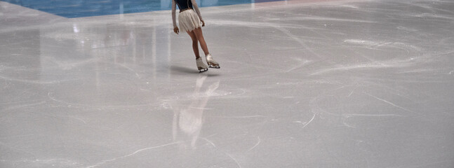 Fototapeta na wymiar women's figure skating. Champion's training hard.