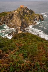 Daily exposure of the island of San Juan de Gaztelugatxe and its hermitage, located between the coastal towns of Bakio and Bermeo joined to the coast by a stone bridge and a 241-step staircase, Basque