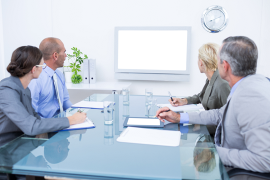 Business team looking at time clock 