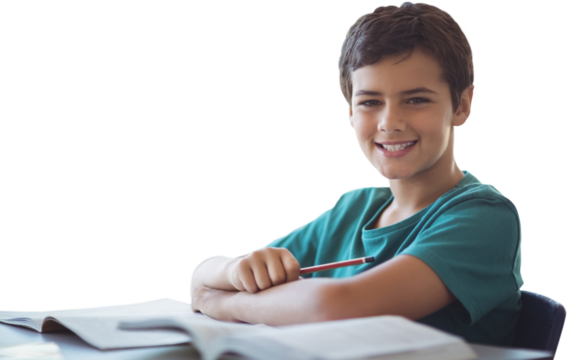 Portrait of boy doing homework