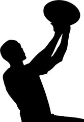 Athlete with arms raised while playing rugby