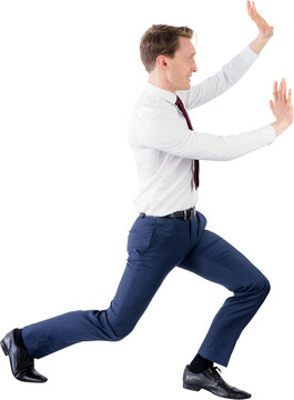A businessman pushing something