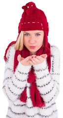 Festive blonde blowing over hands