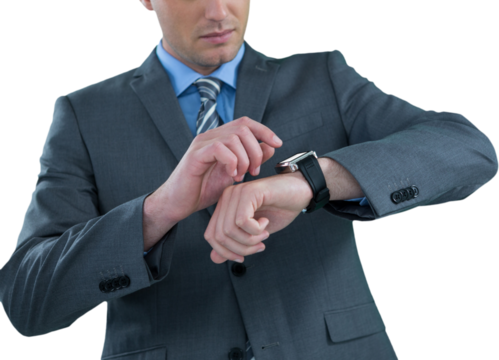 Businessman checking smart watch