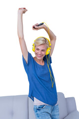 Happy woman listening music with mobile phone