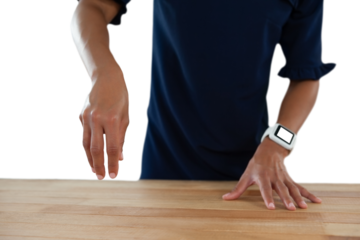 Businesswoman pretending to work on an invisible object