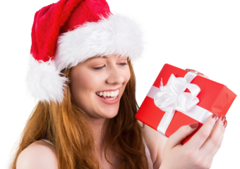 Festive redhead holding a gift