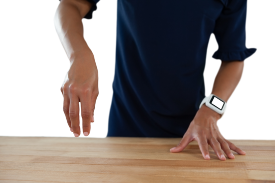 Businesswoman pretending to work on an invisible object