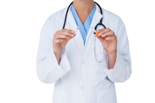 Doctor holding broken cigarette as incentive to quit