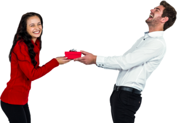 Happy young couple holding gift box