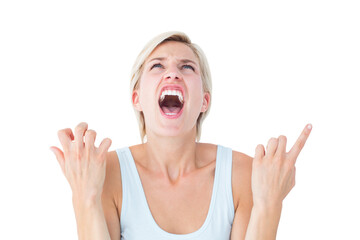 Upset woman screaming with hands up 