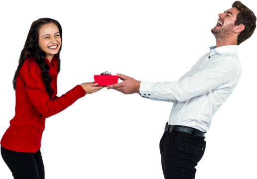 Happy young couple holding gift box