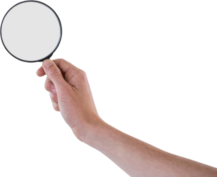 Hand holding magnifying glass