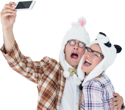 Geeky hipster couple taking selfie with smart phone 