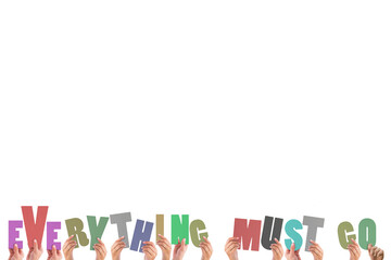 Colorful alphabet spelling everything must go held up by people 
