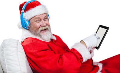 Portrait of Santa Claus listening music with digital tablet 