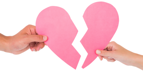 Couple holding two halves of broken heart