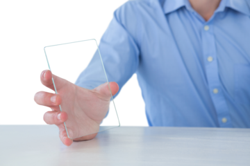 Mid section of businessman showing glass interface