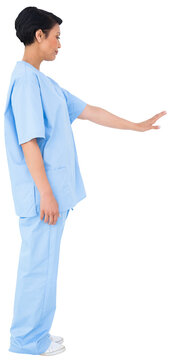 Young Surgeon Gesturing 