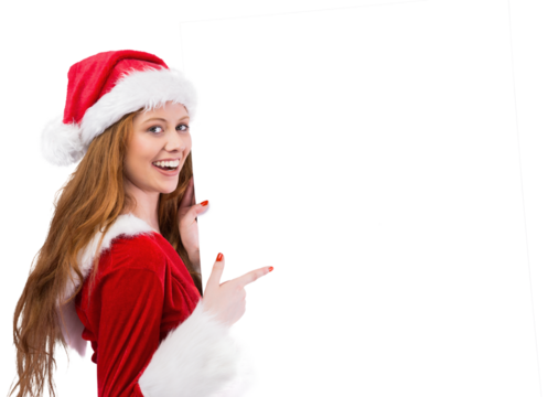 Festive redhead smiling at camera holding poster - Powered by Adobe