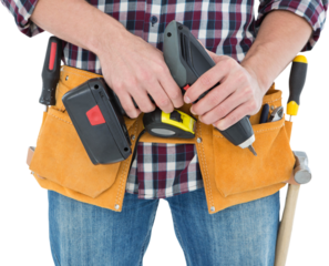 Male repairman holding drill machine