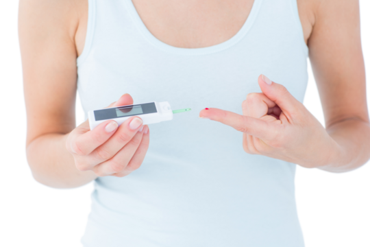 Woman testing her blood glucose level 