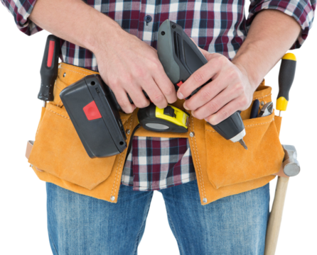 Male repairman holding drill machine