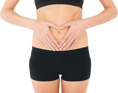 Closeup mid section of a fit woman in black shorts