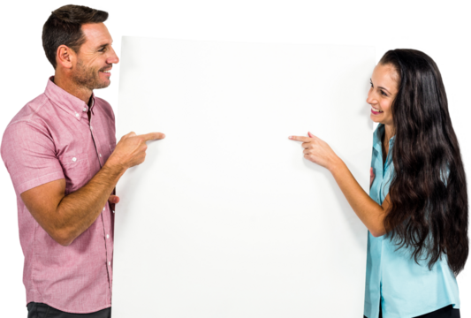 Couple holding pointing on white sheet