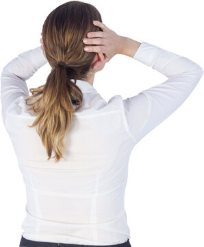 Businesswoman covering ears over white background