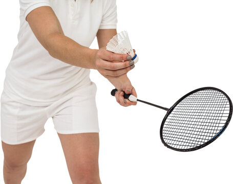 Female athlete holding a badminton racquet ready to serve