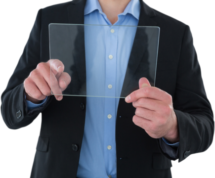 Mid section of businessman touching transparent glass interface