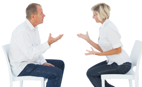 Older couple sitting in chairs arguing - Powered by Adobe