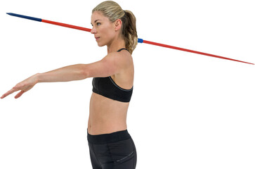 Side view of woman throwing javelin