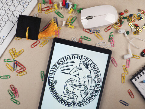 In this photo illustration,  Universidad de Buenos Aires (UBA)  logo seen displayed on a tablet.
