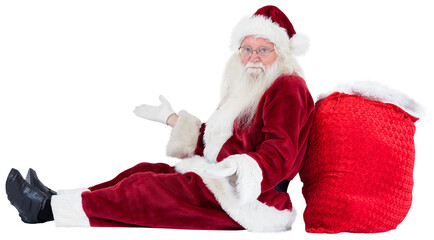 Santa sits leaned on his bag and has no clue