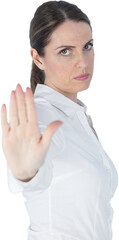 Businesswoman making stop sign over white background