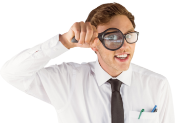 Geeky businessman looking through magnifying glass