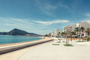 Altea seaside promenade with recreation and active leisure areas on sunny day. Altea - beautiful authentic Spanish village in Alicante Province, Valencian Community, by Mediterranean Sea in Spain - obrazy, fototapety, plakaty
