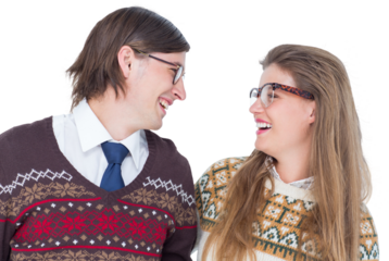 Happy geeky hipster couple looking at each other
