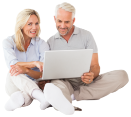 Cheerful couple using laptop