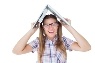 Geeky hipster holding her laptop over her head 