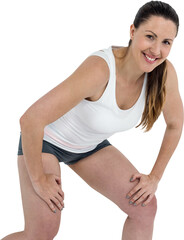 Female athlete posing on white background