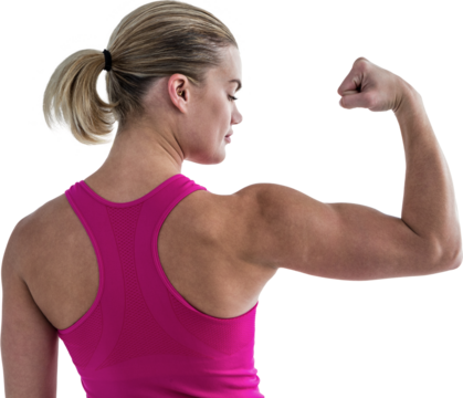 Rear view of muscular woman flexing muscles 