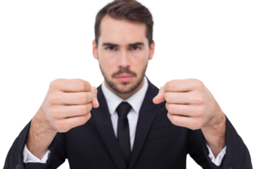 Exasperated businessman with clenched fists 