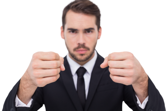 Exasperated businessman with clenched fists 