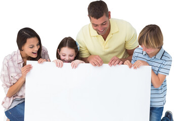 Family of four looking at billboard