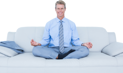 businessman meditating in yoga pose