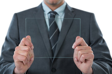 Midsection of businessman holding futuristic digital tablet